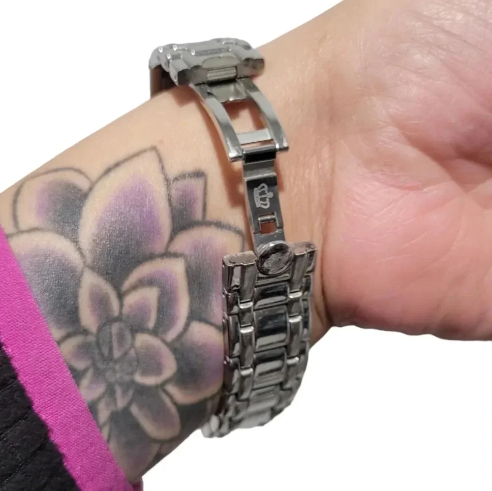 Juicy Couture stainless steel pink watch